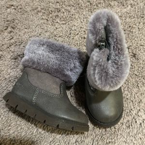 Brand new Carter’s fuzzy top boots size 4